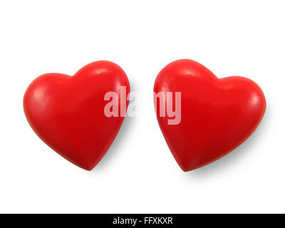 Zwei rote Herzen, auf dem weißen Hintergrund isoliert. Stockfoto