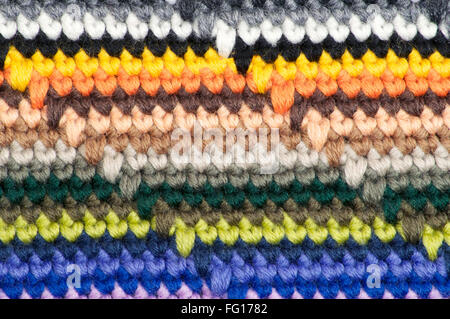 Gestreifte gestrickte Hintergrund hautnah in verschiedenen Farben Stockfoto