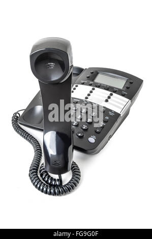 Business Festnetz-Telefon, isoliert auf weiss mit dem Empfänger aus dem Schneider in einer Position wie eine Schlange stehen. Stockfoto