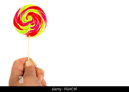 Mann Hand mit Lollipop isoliert auf weißem Hintergrund Stockfoto