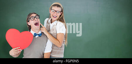 Zusammengesetztes Bild aufgeregt geeky Hipster und seine Freundin Stockfoto