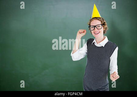 Zusammengesetztes Bild geeky Hipster einen Party Hut Stockfoto