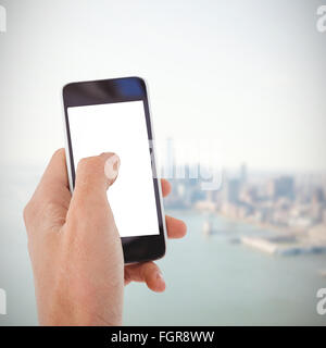 Zusammengesetztes Bild beschnitten Hand des Mannes mit Handy Stockfoto