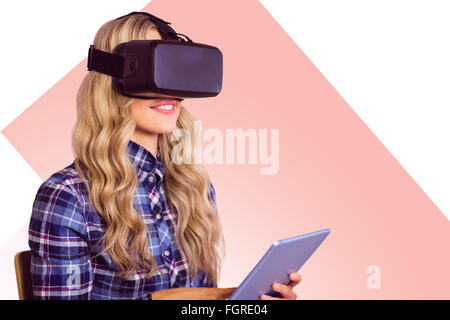 Zusammengesetztes Bild ziemlich lässig Arbeitnehmers mit Oculus rift Stockfoto