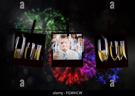 Zusammengesetztes Bild von internationalen Geschäftsleuten Toasten mit Champagner Stockfoto