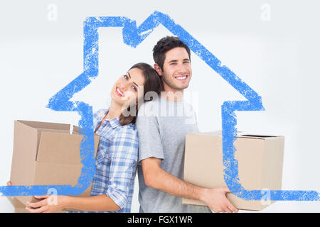 Zusammengesetztes Bild von Frau und Mann mit Boxen in ihrem neuen Haus Stockfoto