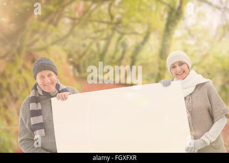 Zusammengesetztes Bild Winter paar zeigt Poster Stockfoto