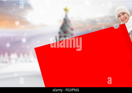 Zusammengesetztes Bild Winter paar zeigt Poster Stockfoto