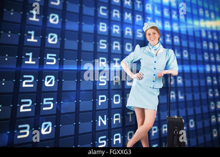 Zusammengesetztes Bild der hübschen Stewardess lächelt in die Kamera Stockfoto