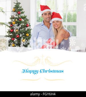 Zusammengesetztes Bild des Brautpaares zu Weihnachten Stockfoto