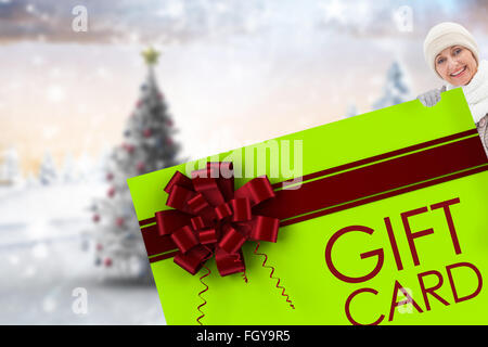 Zusammengesetztes Bild Winter paar zeigt Poster Stockfoto