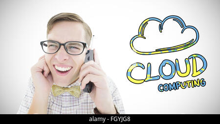 Zusammengesetztes Bild geeky Hipster hält ein Retro-Handy Stockfoto