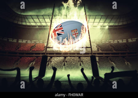 Zusammengesetztes Bild von Silhouetten von Fußballfans Stockfoto