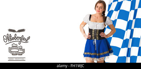 Zusammengesetztes Bild von hübschen Oktoberfest Mädchen lächelnd in die Kamera Stockfoto