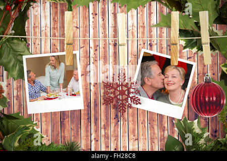 Zusammengesetztes Bild von hängenden Weihnachtsbilder Stockfoto