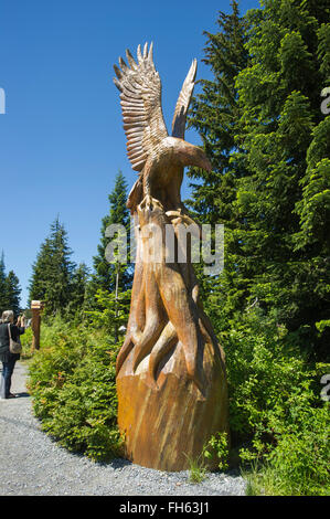 Melden Sie sich Holzschnitzereien, Grouse Mountain, Britisch-Kolumbien Stockfoto