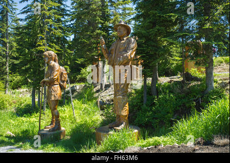 Melden Sie sich Holzschnitzereien, Grouse Mountain, Britisch-Kolumbien Stockfoto