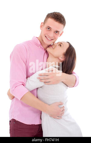 Jungen heterosexuellen Paaren möglich gerade geheiratet, eine Frau und ein Mann zusammenstehen und sanft umarmt. Stockfoto