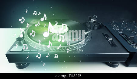 Musizieren mit Audionotizen glühende Plattenteller Stockfoto