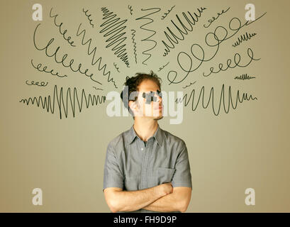 Junger Mann mit verklebten Augen und geschweiften Linien Stockfoto