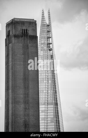 Hoch gemauerten Schornstein der Londoner Tate Gallery vor dem Shard-Turm Stockfoto