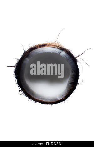 Kokosnuss Hälfte in ihrer Schale Stockfoto