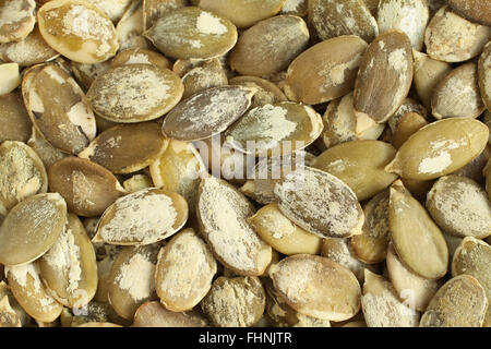 Essen-Hintergrund - große geschälte Kürbiskerne Stockfoto