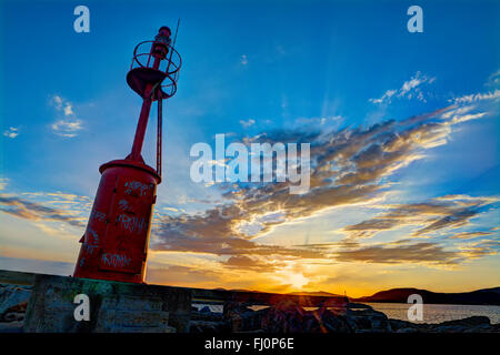 roten Leuchtturm in Alghero bei Sonnenuntergang Stockfoto