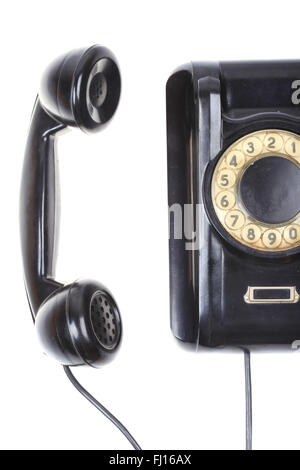 alte Vintage Telefon mit Wählscheibe isoliert auf weißem Hintergrund Stockfoto