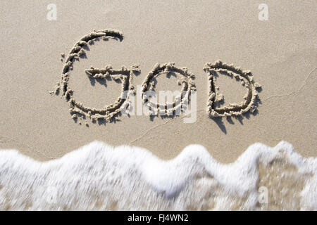 "Gott" in Sand geschrieben Stockfoto