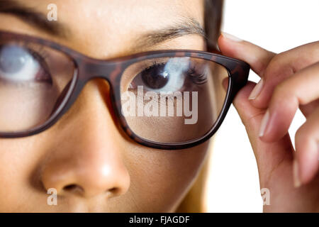 Nahaufnahme der Geschäftsfrau hält ihre Brille Stockfoto