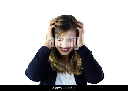 Frau, die ihren Kopf zu berühren Stockfoto