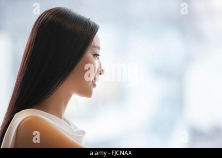 Profil von junge Chinesin Stockfoto