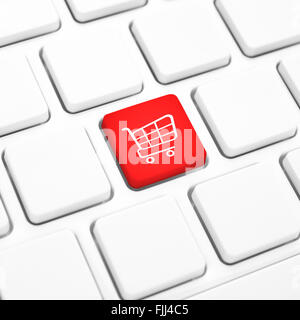 Shop-Online-Business-Konzept, rote Warenkorb-Button oder Taste auf weiße Tastatur Stockfoto