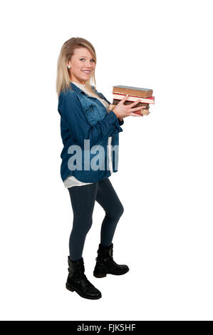 Schöne Frau mit einem Stapel von Büchern aus der Bibliothek Stockfoto