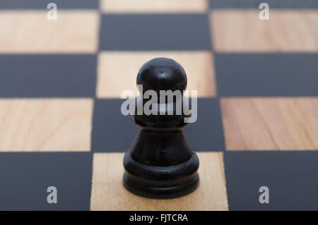 Einen einzigen Bauern auf dem Schachbrett Stockfoto