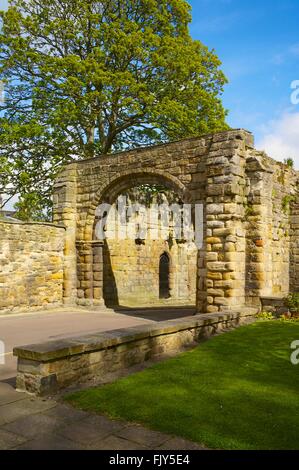 St Wilfrid Tor. Mittelalterlichen steinernen Torbogen. Hexham Abtei, Hexham, Northumberland, England, Vereinigtes Königreich. Stockfoto