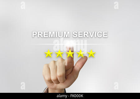 Unternehmen der Hand Premiumservice mit fünf Sternen im Bildschirm klicken Stockfoto