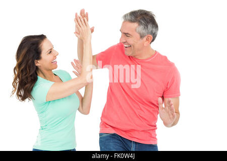 Aufgeregt paar geben ein High-Five Stockfoto