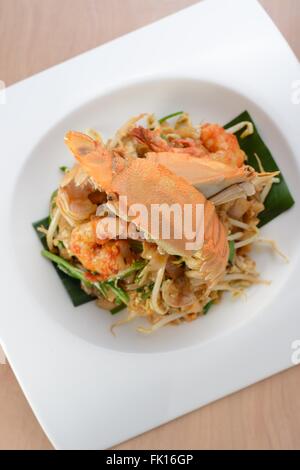 Char Kuey Teow, Penang berühmte gebratene Reisnudeln Stockfoto