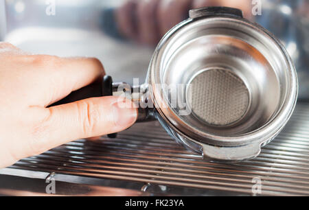 Kaffee zu mahlen in Gruppe mit Kaffeemaschine, Fotoarchiv Stockfoto