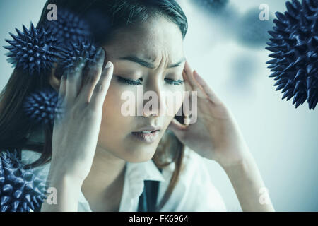 Zusammengesetztes Bild der nervösen Geschäftsfrau hält ihren Kopf Stockfoto