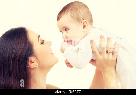 glückliche Mutter mit Baby Stockfoto
