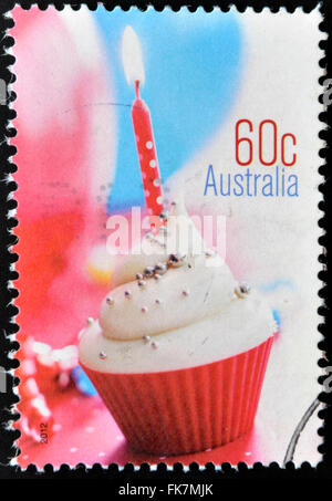 Australien - ca. 2012: Eine Briefmarke gedruckt in Australien gewidmet "Momente", zeigt Cupcake, ca. 2012 Stockfoto