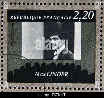 Frankreich - CIRCA 1986: Stempel zur Hundertjahrfeier des französischen Kinos zeigt Max Linder, ca. 1986 Stockfoto