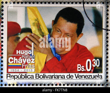 BOLIVARIAN Republik von VENEZUELA - ca. 2013: Eine Briefmarke gedruckt in Venezuela zeigt Hugo Rafael Chávez (1954-2013) Stockfoto