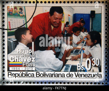 BOLIVARIAN Republik von VENEZUELA - ca. 2013: Eine Briefmarke gedruckt in Venezuela zeigt Hugo Rafael Chávez (1954 – 2013), Präsident Stockfoto