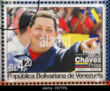 BOLIVARIAN Republik von VENEZUELA - ca. 2013: Eine Briefmarke gedruckt in Venezuela zeigt Hugo Rafael Chávez (1954 – 2013), Präsident Stockfoto