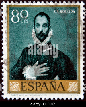 Spanien - ca. 1961: Eine Briefmarke gedruckt in Spanien zeigt Edelmann mit seiner Hand auf seine Brust von Greco, ca. 1961 Stockfoto
