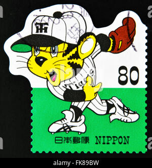 JAPAN - CIRCA 1999: Eine Briefmarke gedruckt in Japan zeigt Symbol des Tigers Baseball, circa 1999 Stockfoto